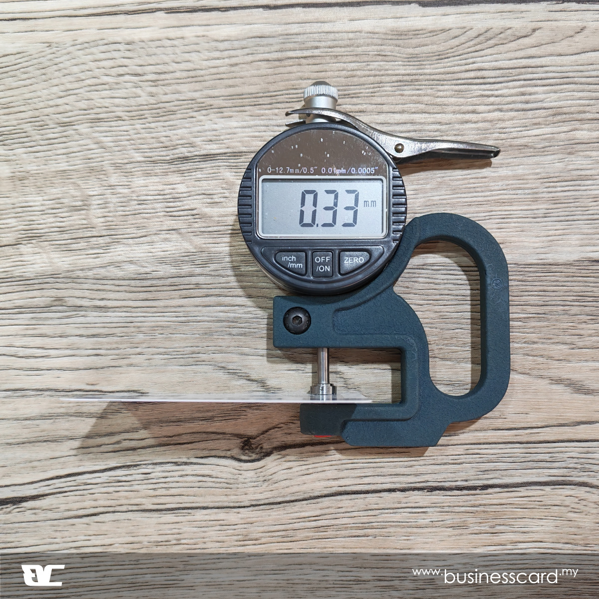 250gsm art card thickness measured with a caliper