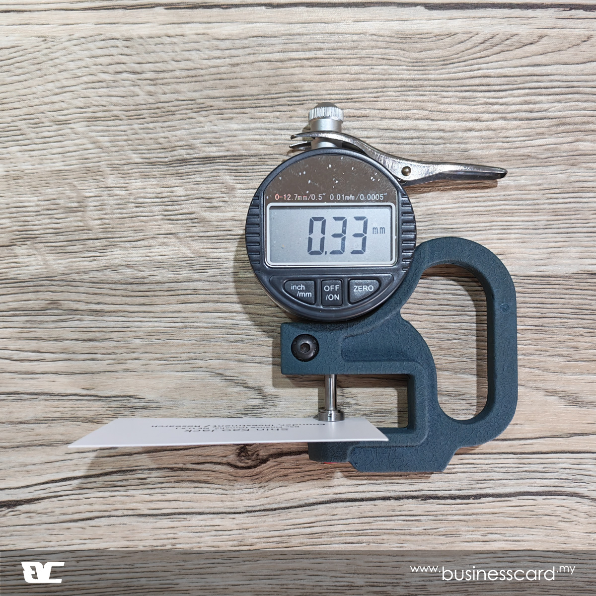 250gsm art card thickness measured with a caliper