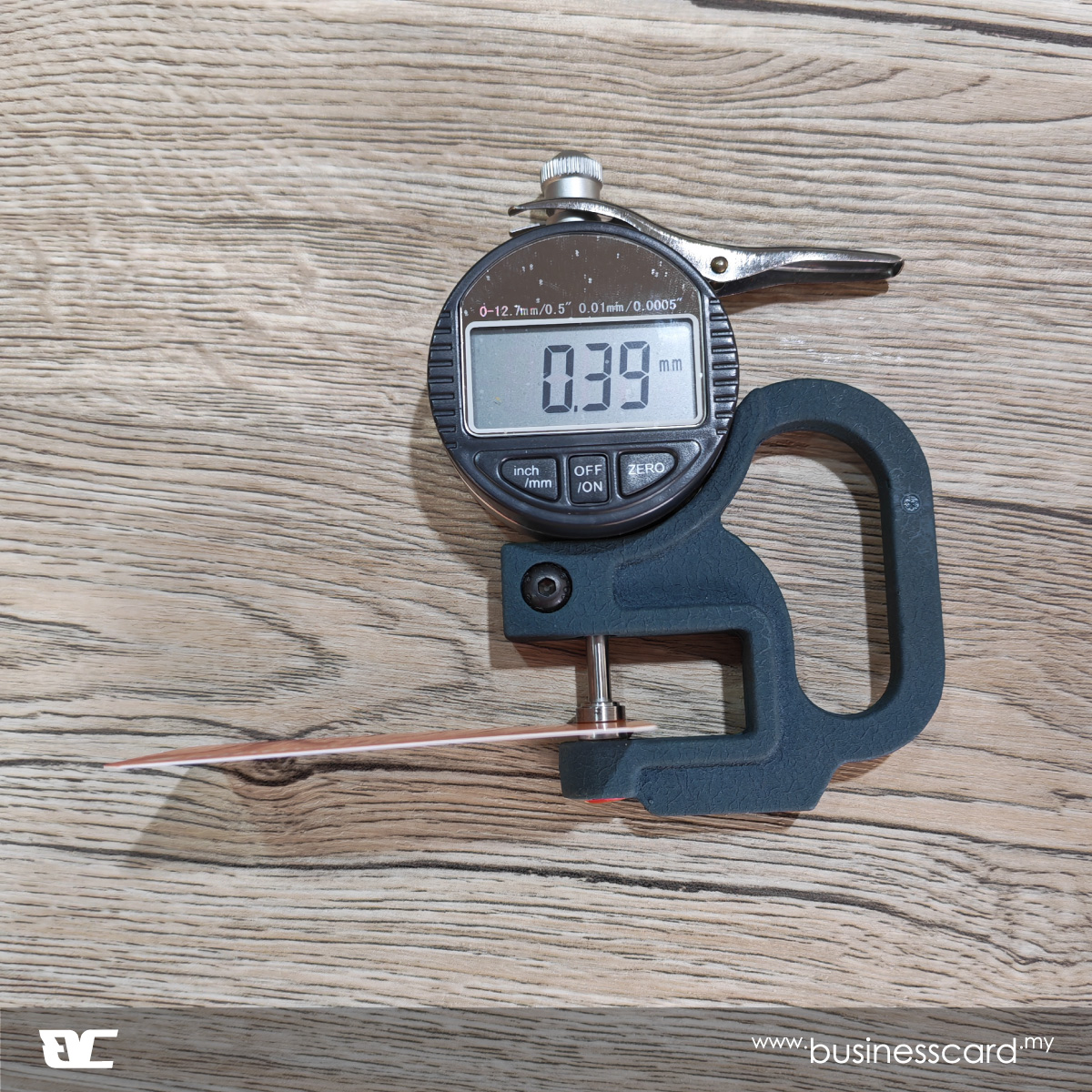 310gsm art card thickness measured with a caliper