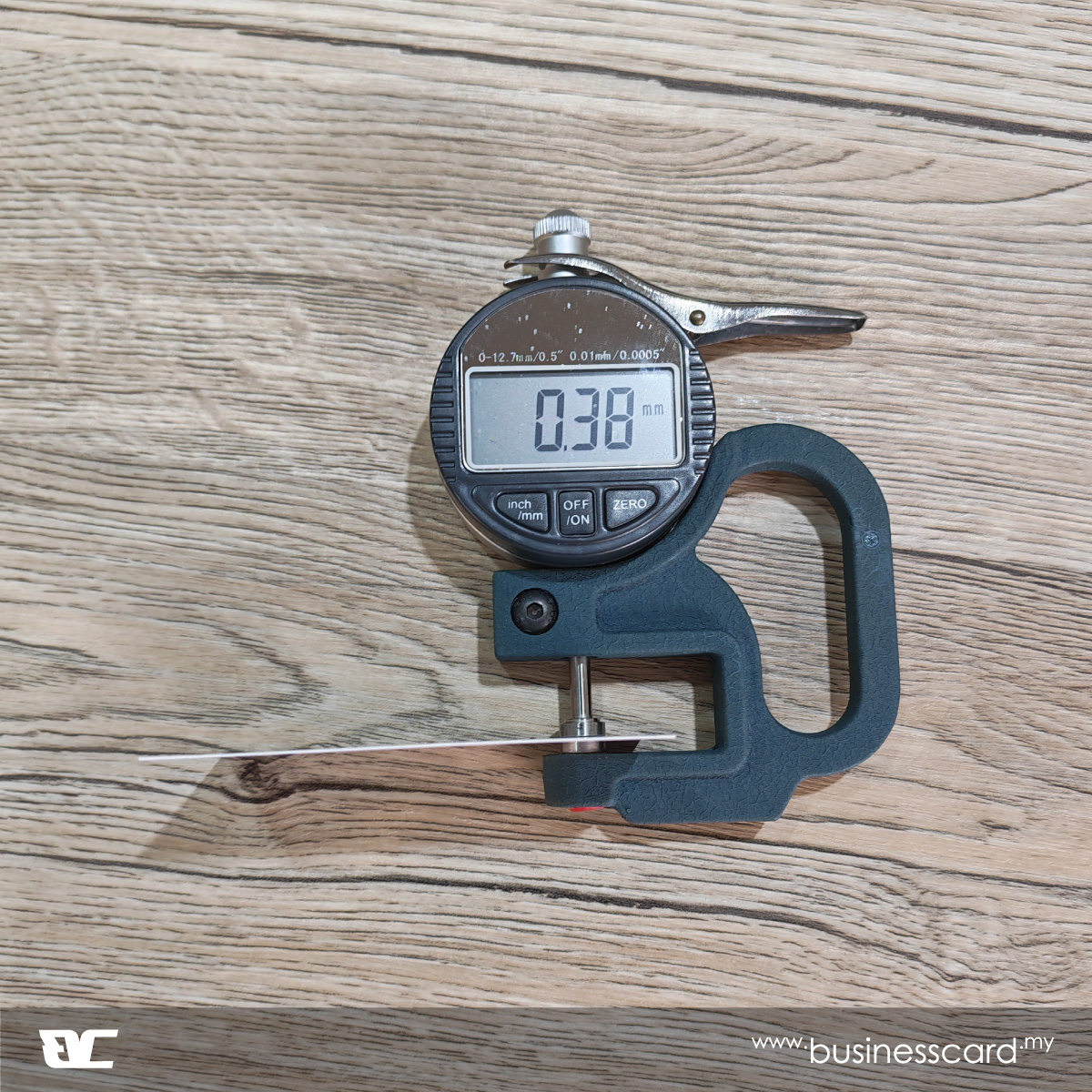 310gsm art card thickness measured with a caliper